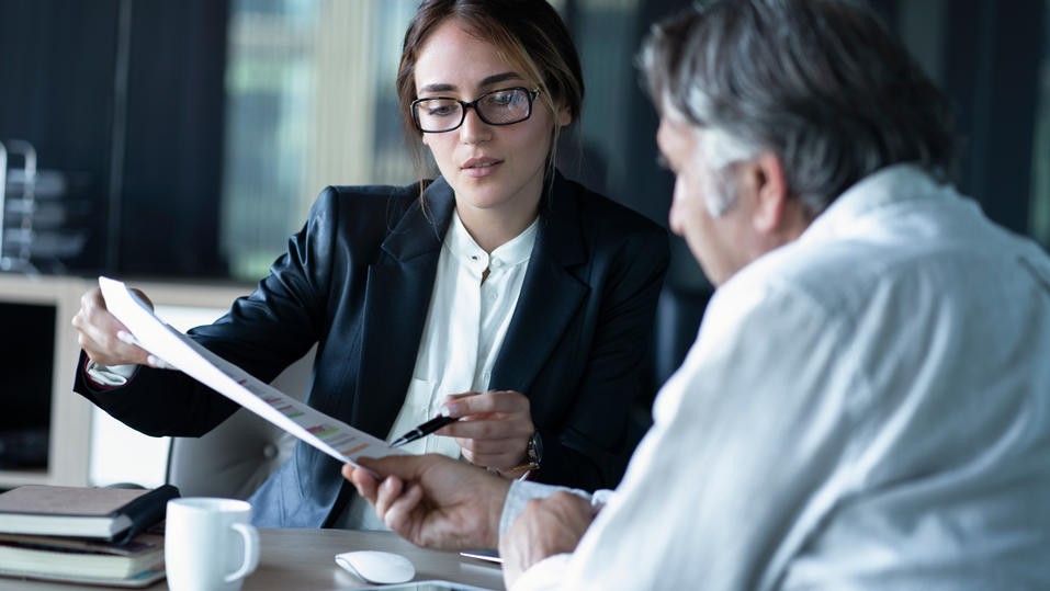 Young employee in consultation with client